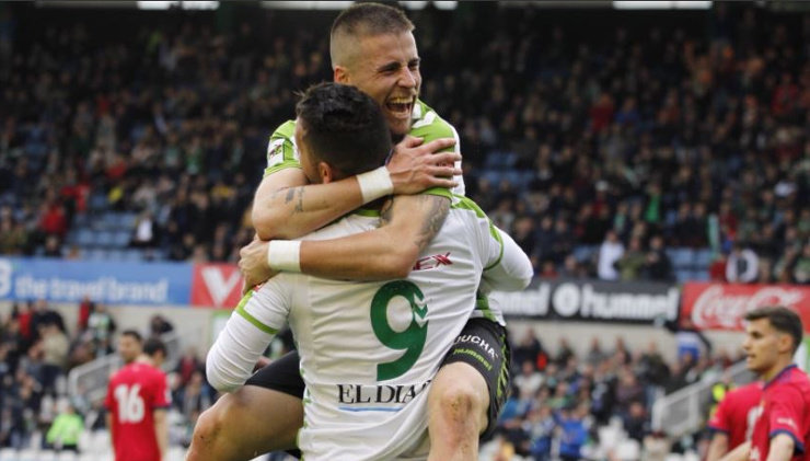 Dani Aquino y Borja Lázaro celebran el gol anotado por el murciano