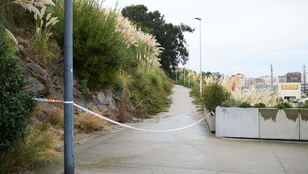 Cordón policial en las inmediaciones de la zona de Santander donde la Policía encontró los restos de la mujer asesinada



FOTO: Juan Manuel Serrano Arce